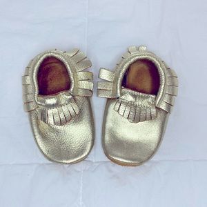 Gold moccasins